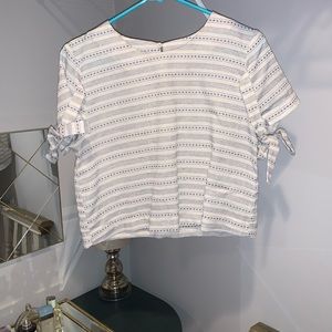 Striped blouse with ties on the sleeves